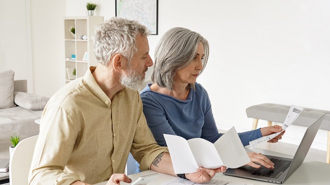 middle_aged_couple_checking_their_superannuation_statements